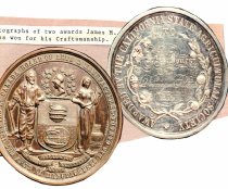 Two awards James "Gunsmith" Monroe Jones won for his pistols